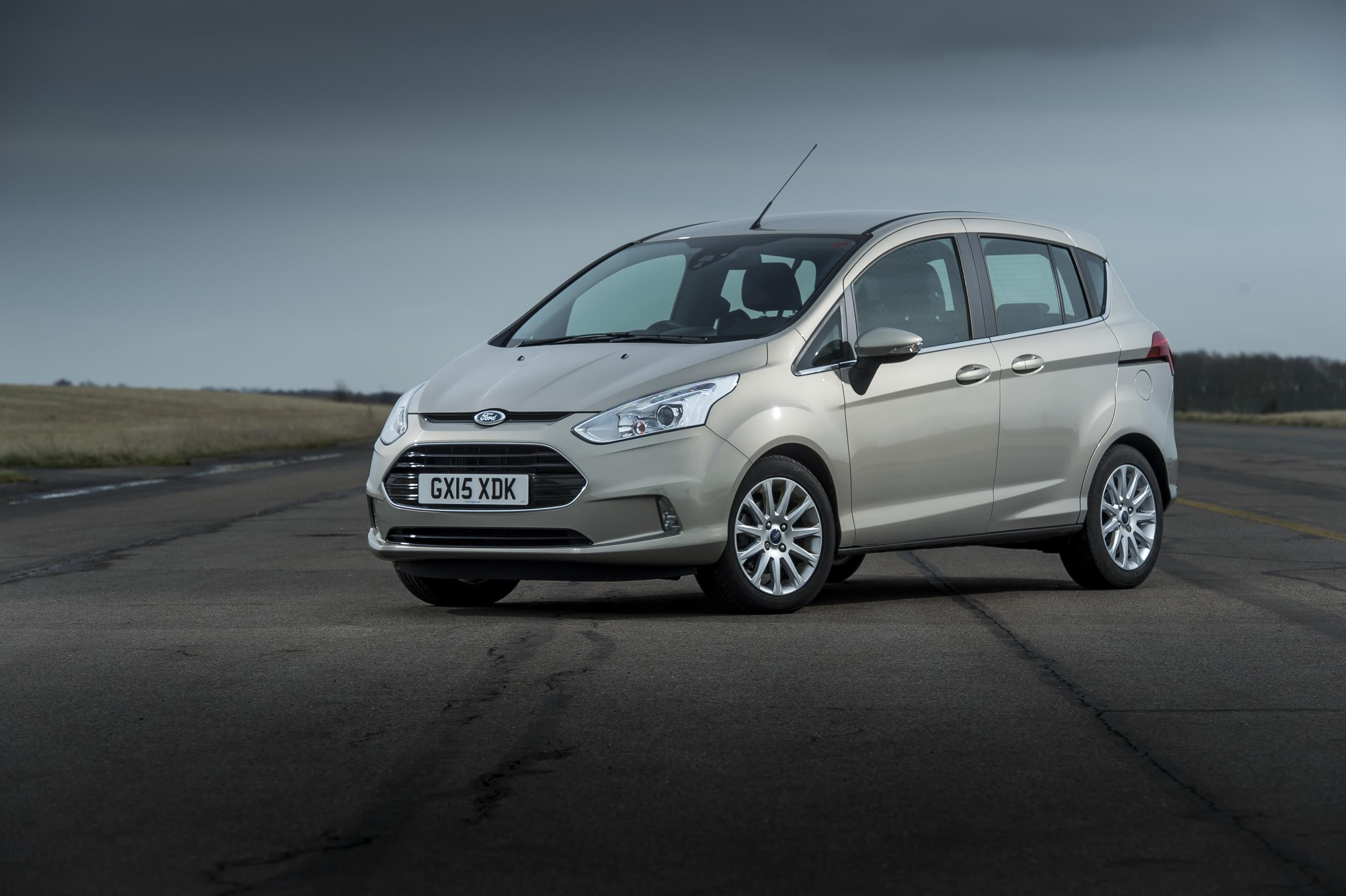 Light grey Ford B-Max parked facing three-quarters left on airport runway.